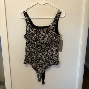 Black and White thick animal print bodysuit from Banana Republic size small